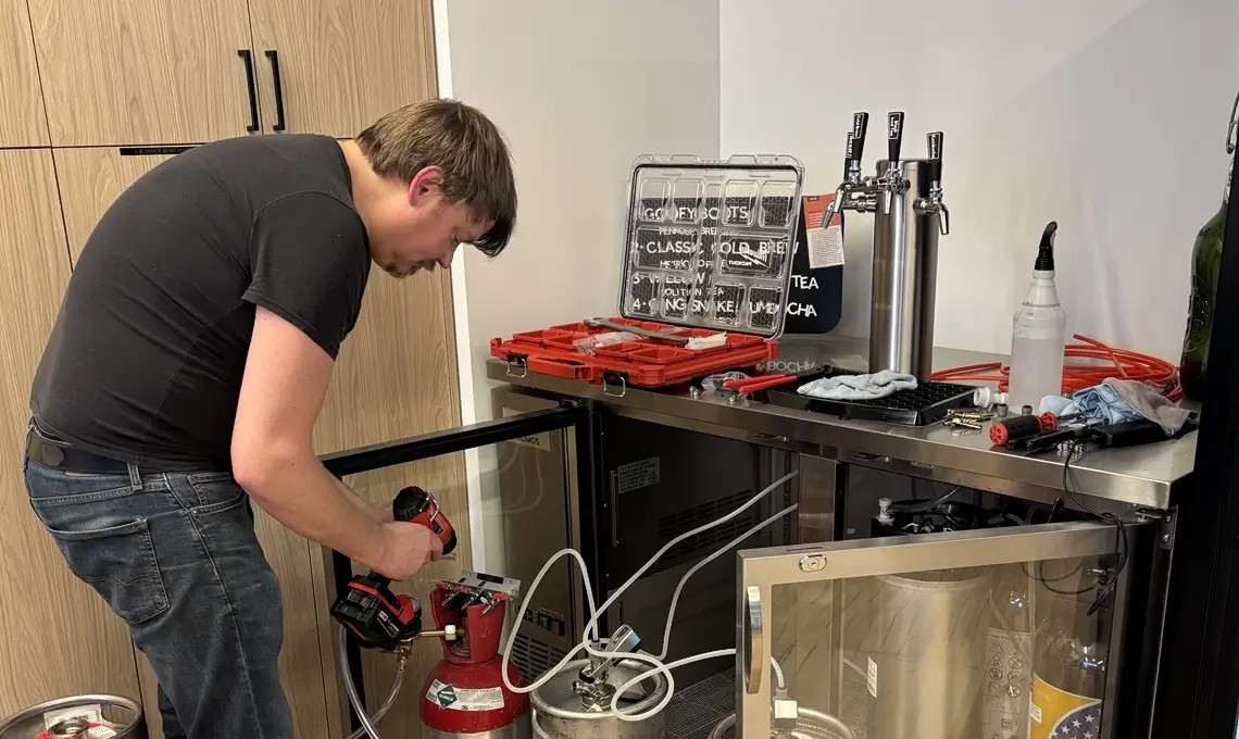 Gnome Brew technician servicing a commercial draft beer system in Chicago